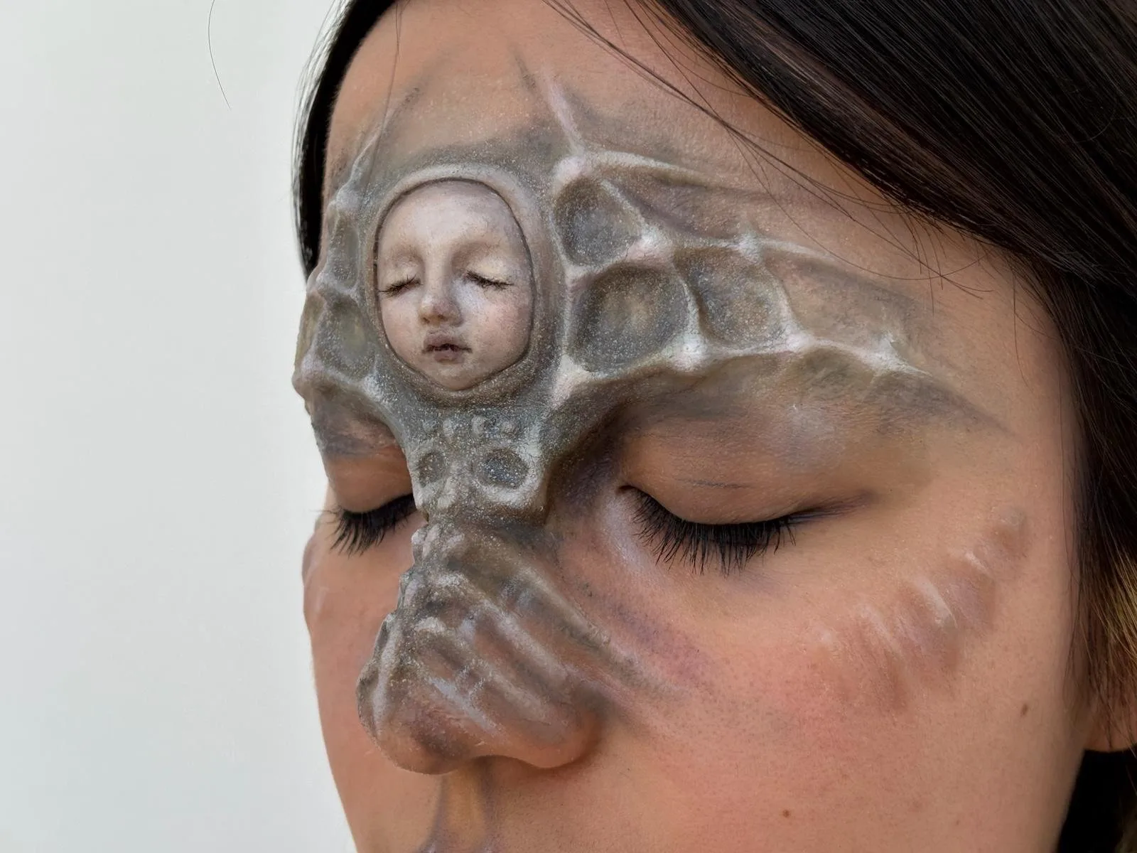 Finished prosthetics makeup in profile